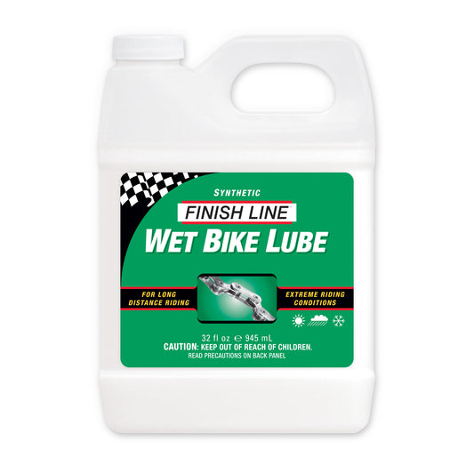 Finish Line wet bike lube-olja i vit flaska med etikett, 945 ml